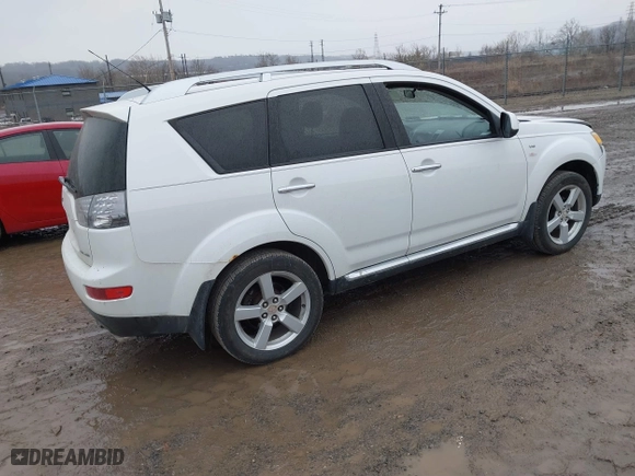 2009 Mitsubishi Outlander XLS with VIN JA4MT41X79Z012998, listed as a IAAI auction lot 41672540 with 120,058 mi miles. Bid and sale history available at carsss.com. Image 4.