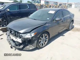 2014 Mazda 6 i Touring with VIN JM1GJ1V55E1105379, listed as a IAAI auction lot 42010585 with 153,870 mi miles and . Bid and sale history available at DreamBid. Image 20.