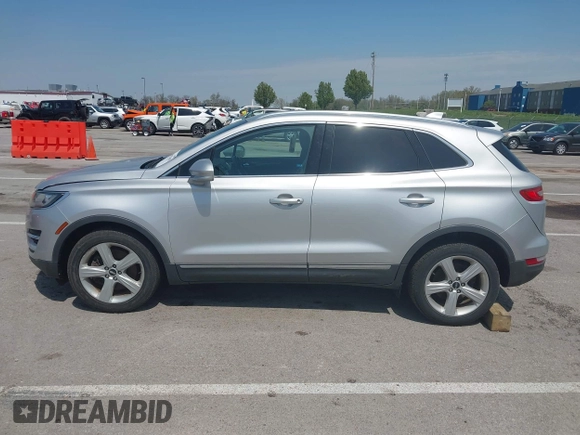 2015 Lincoln MKC with VIN 5LMCJ2A94FUJ16038, listed as a IAAI auction lot 42057400 with 102,848 mi miles. Bid and sale history available at carsss.com. Image 14.