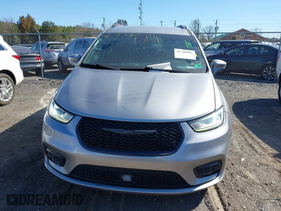 2021 Chrysler Pacifica Touring z VIN 2C4RC1FG8MR565455, wystawiony jako IAAI lot #41796891 z przebiegiem 105 645 mil mil oraz . Historia ofert i sprzedaży dostępna na DreamBid. Obrazek 12.