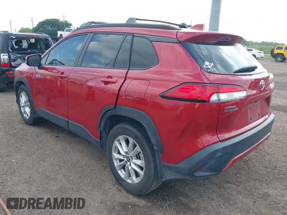 2023 Toyota Corolla Cross LE z VIN 7MUCAAAG4PV047301, wystawiony jako IAAI lot #42107515 z przebiegiem 27 137 mil mil oraz . Historia ofert i sprzedaży dostępna na DreamBid. Obrazek 3.