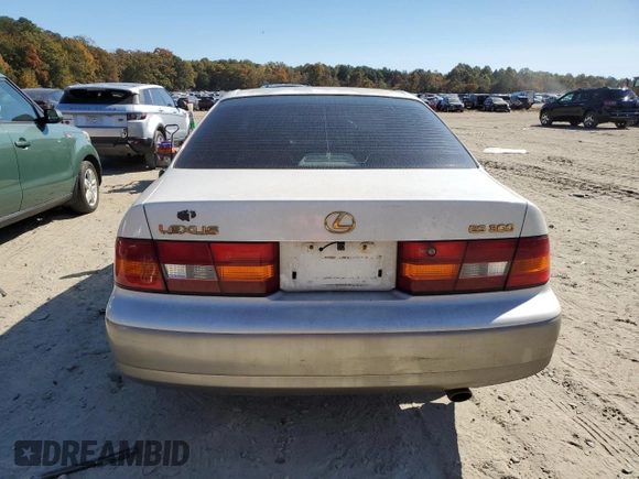 1998 Lexus ES 300 Luxury Sport Sdn with VIN JT8BF28G2W0108194, listed as a Copart auction lot 76390234 with 201,637 mi miles and Salvage Title. Bid and sale history available at carsss.com. Image 6.