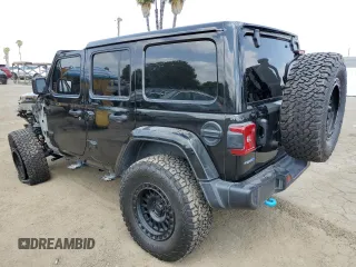 2024 Jeep Wrangler Sahara with VIN 1C4RJXP60RW116607, listed as a Copart auction lot 54562695 with 62,352 mi miles and Salvage title. Bid and sale history available at DreamBid. Image 2.