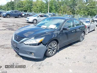 2017 Nissan Altima SV with VIN 1N4AL3AP0HC144575, listed as a IAAI auction lot 40129580 with 184,765 mi miles and . Bid and sale history available at DreamBid. Image 2.