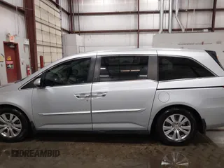 2015 Honda Odyssey EX-L with VIN 5FNRL5H66FB028822, listed as a IAAI auction lot 42067242 with 122,354 mi miles and . Bid and sale history available at carsss.com. Image 14.