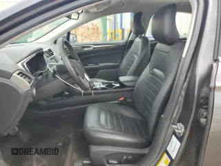 2015 Ford Fusion SE Hybrid with VIN 3FA6P0LUXFR220930, listed as a Copart auction lot 58407235 with 179,682 mi miles and Salvage title. Bid and sale history available at DreamBid. Image 7.