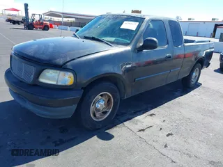 1999 Ford F-150 with VIN 1FTRX17W5XKB46900, listed as a IAAI auction lot 41792177 with Not provided miles and . Bid and sale history available at DreamBid. Image 2.
