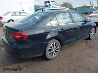 2018 Volkswagen Jetta 1.4T SE with VIN 3VWDB7AJ8JM240887, listed as a IAAI auction lot 40657661 with 76,568 mi miles. Bid and sale history available at carsss.com. Image 4.