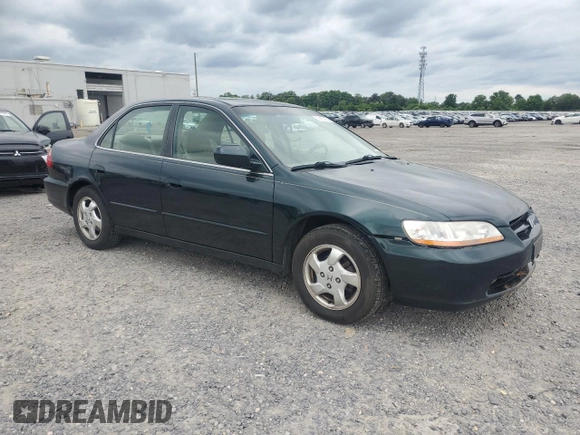 2000 Honda Accord EX z VIN 1HGCG6674YA001515, wystawiony jako Copart lot #56257935 z przebiegiem 215 030 mil mil oraz Czysty tytuł • Clean title. Historia ofert i sprzedaży dostępna na DreamBid. Obrazek 4.