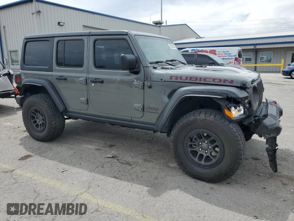 2023 Jeep Wrangler Rubicon with VIN 1C4JJXFG4PW523432, listed as a Copart auction lot 51642975 with 23,631 mi miles and Salvage title. Bid and sale history available at DreamBid. Image 4.