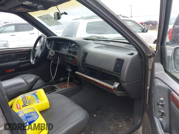 1998 Jeep Grand Cherokee Limited with VIN 1J4GZ88Z7WC223496, listed as a IAAI auction lot 41484317 with 244,567 mi miles. Bid and sale history available at carsss.com. Image 5.