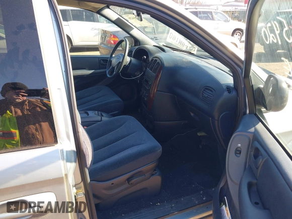 2003 Chrysler Town & Country LX with VIN 2C4GP44L73R238380, listed as a IAAI auction lot 41705420 with 129,225 mi miles and . Bid and sale history available at DreamBid. Image 5.