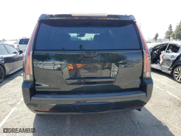 2015 Cadillac Escalade Premium with VIN 1GYS4NKJ4FR550767, listed as a Copart auction lot 45605755 with 121,862 mi miles and Salvage Title. Bid and sale history available at carsss.com. Image 6.