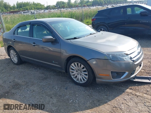 2011 Ford Fusion Hybrid with VIN 3FADP0L34BR253253, listed as a IAAI auction lot 42458290 with 137,110 mi miles and . Bid and sale history available at DreamBid. Image 1.