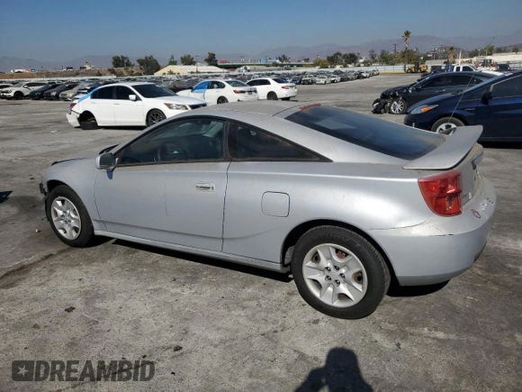 2003 Toyota Celica GT with VIN JTDDR32T130164099, listed as a Copart auction lot 77907374 with 73,950 mi miles and Salvage Title. Bid and sale history available at carsss.com. Image 2.