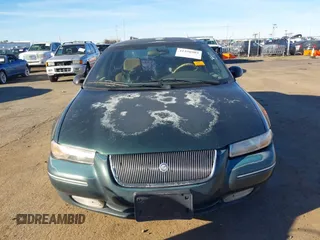 1997 Chrysler Cirrus LXi z VIN 1C3EJ56H2VN720573, wystawiony jako IAAI lot #41250503 z przebiegiem 176 046 mil mil oraz . Historia ofert i sprzedaży dostępna na DreamBid. Obrazek 6.