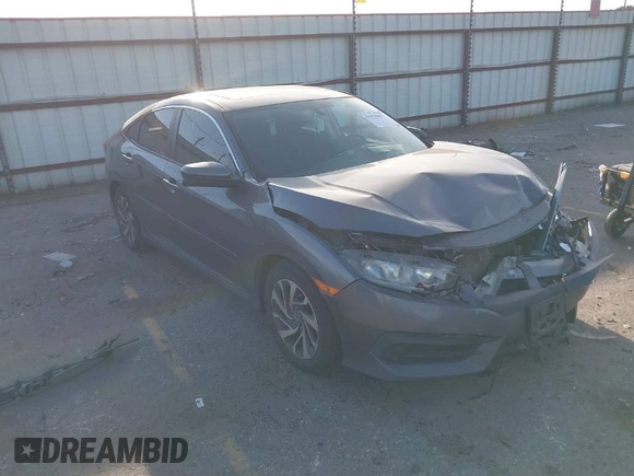 2016 Honda Civic Sedan EX with VIN 19XFC2F74GE064349, listed as a IAAI auction lot 41810683 with 129,817 mi miles. Bid and sale history available at carsss.com. Image 1.