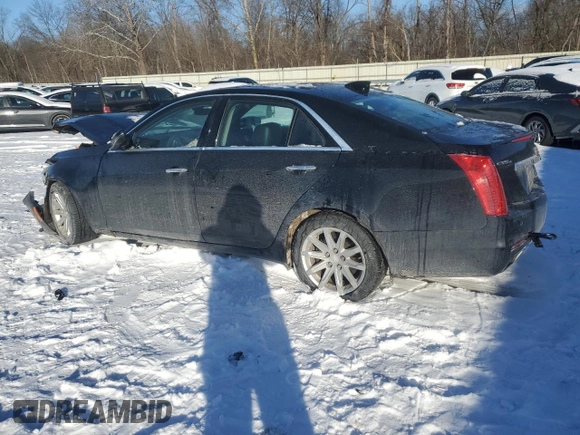 2016 Cadillac CTS AWD with VIN 1G6AW5SXXG0107872, listed as a Copart auction lot 87631955 with 51,624 mi miles and Salvage title. Bid and sale history available at DreamBid. Image 2.