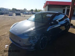 2022 Tesla Model Y Long Range with VIN 7SAYGDEE2NA017434, listed as a IAAI auction lot 41842025 with 35,164 mi miles and . Bid and sale history available at DreamBid. Image 17.