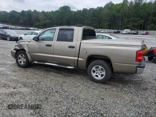 2006 Dodge Dakota SLT with VIN 1D7HE48N66S641149, listed as a Copart auction lot 58823615 with 169,002 mi miles and Salvage title. Bid and sale history available at DreamBid. Image 2.