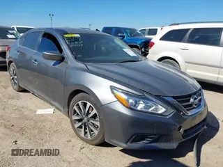 2018 Nissan Altima SV with VIN 1N4AL3AP5JC210429, listed as a IAAI auction lot 38777447 with 129,319 mi miles and . Bid and sale history available at carsss.com. Image 1.
