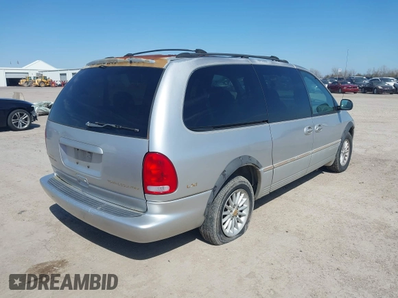 1999 Chrysler Town & Country LXi with VIN 1C4GP54L9XB872347, listed as a IAAI auction lot 41611666 with 224,817 mi miles. Bid and sale history available at carsss.com. Image 4.