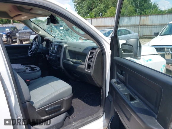 2019 Ram 1500 Tradesman with VIN 1C6RR6FG1KS704789, listed as a IAAI auction lot 42631637 with 130,486 mi miles and . Bid and sale history available at DreamBid. Image 5.