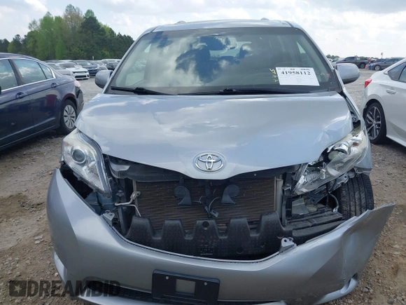 2015 Toyota Sienna XLE with VIN 5TDYK3DC7FS659864, listed as a IAAI auction lot 41958112 with 121,257 mi miles and . Bid and sale history available at DreamBid. Image 12.