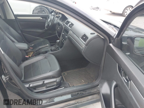 2014 Volkswagen Passat Wolfsburg Edition with VIN 1VWAT7A38EC071608, listed as a IAAI auction lot 42784046 with 172,728 mi miles and . Bid and sale history available at DreamBid. Image 5.