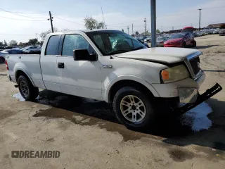 2006 Ford F-150 XLT with VIN 1FTPX12516KB96780, listed as a Copart auction lot 55621015 with 168,831 mi miles and Salvage title. Bid and sale history available at DreamBid. Image 4.
