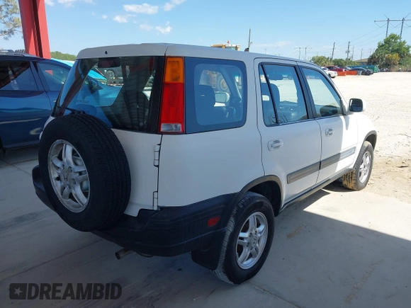 1999 Honda CR-V EX with VIN JHLRD1860XC037846, listed as a IAAI auction lot 42037921 with 164,477 mi miles. Bid and sale history available at carsss.com. Image 4.
