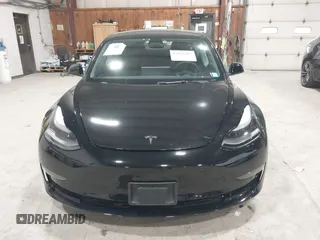 2023 Tesla Model 3 with VIN 5YJ3E1EA5PF552241, listed as a IAAI auction lot 41876487 with 18,533 mi miles and . Bid and sale history available at carsss.com. Image 12.