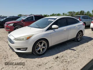 2015 Ford Focus Titanium with VIN 1FADP3J23FL248349, listed as a Copart auction lot 52599275 with 124,450 mi miles and Clean Title. Bid and sale history available at carsss.com. Image 1.
