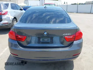 2015 BMW 4 Series 428i with VIN WBA4A5C59FG052596, listed as a IAAI auction lot 42649927 with 68,842 mi miles and . Bid and sale history available at DreamBid. Image 16.
