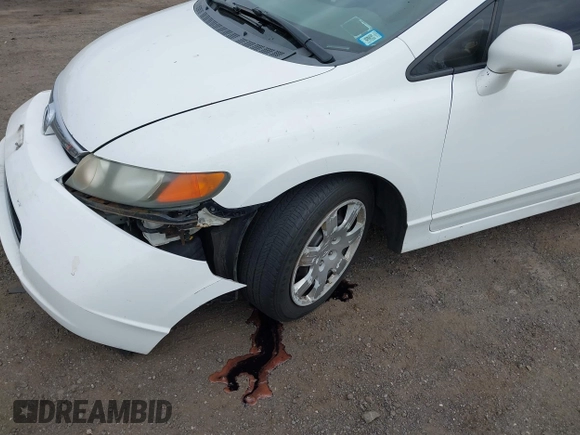 2006 Honda Civic LX with VIN 1HGFA16556L084177, listed as a IAAI auction lot 42053325 with 142,664 mi miles and . Bid and sale history available at DreamBid. Image 13.