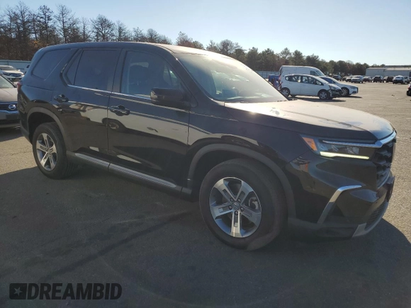 2023 Honda Pilot EX-L 7 Passenger with VIN 5FNYG1H52PB013462, listed as a Copart auction lot 79597574 with 25,302 mi miles and Salvage Title. Bid and sale history available at carsss.com. Image 4.