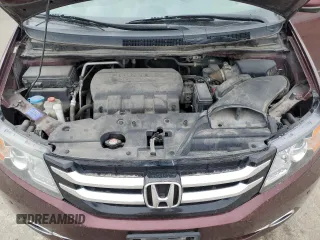 2016 Honda Odyssey Touring Elite with VIN 5FNRL5H96GB125546, listed as a Copart auction lot 54954165 with 101,479 mi miles and Salvage Title. Bid and sale history available at DreamBid. Image 12.