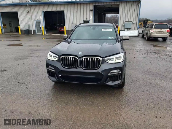 2019 BMW X3 M40i with VIN 5UXTS3C54K0Z03897, listed as a Copart auction lot 51805765 with 73,374 mi miles and Salvage Title. Bid and sale history available at DreamBid. Image 11.