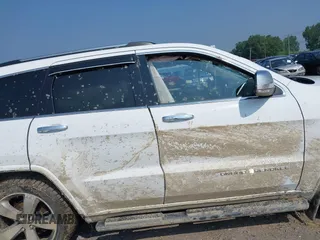 2015 Jeep Grand Cherokee Overland with VIN 1C4RJFCGXFC880096, listed as a IAAI auction lot 42706085 with 74,044 mi miles and . Bid and sale history available at DreamBid. Image 13.
