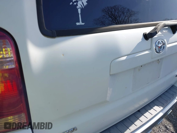 2004 Toyota 4Runner SR5 with VIN JTEBU14R340022054, listed as a IAAI auction lot 41715881 with 217,435 mi miles and . Bid and sale history available at DreamBid. Image 12.