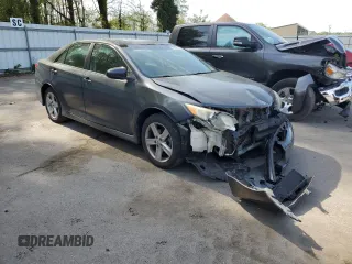 2012 Toyota Camry L with VIN 4T1BF1FKXCU010257, listed as a Copart auction lot 82086254 with 194,023 mi miles and Salvage Title. Bid and sale history available at carsss.com. Image 4.