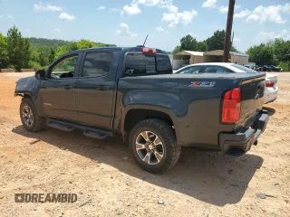 2018 Chevrolet Colorado 4WD Z71 z VIN 1GCGTDEN7J1110282, wystawiony jako Copart lot #61945695 z przebiegiem 144 792 mil mil oraz Szkoda całkowita • Salvage title. Historia ofert i sprzedaży dostępna na DreamBid. Obrazek 2.