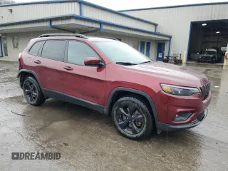 2020 Jeep Cherokee Altitude with VIN 1C4PJMLN1LD550573, listed as a Copart auction lot 80307594 with 56,598 mi miles and Salvage Title. Bid and sale history available at carsss.com. Image 4.