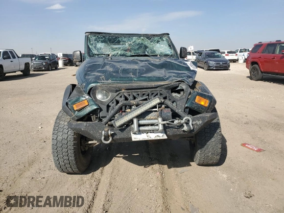 2005 Jeep Wrangler SE with VIN 1J4FA29175P331391, listed as a Copart auction lot 76608824 with 98,268 mi miles and Salvage Title. Bid and sale history available at carsss.com. Image 5.