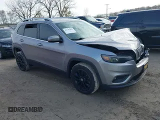 2019 Jeep Cherokee Latitude Plus with VIN 1C4PJLLBXKD123309, listed as a IAAI auction lot 41746458 with 96,353 mi miles. Bid and sale history available at carsss.com. Image 1.