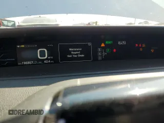 2017 Toyota Prius Plus z VIN JTDKARFP7H3051097, wystawiony jako Copart lot #60288305 z przebiegiem 196 867 mil mil oraz Szkoda całkowita • Salvage title. Historia ofert i sprzedaży dostępna na DreamBid. Obrazek 9.
