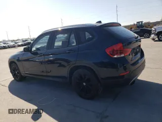2013 BMW X1 xDrive28i with VIN WBAVL1C56DVR88434, listed as a Copart auction lot 52126925 with 136,187 mi miles and Salvage Title. Bid and sale history available at carsss.com. Image 2.