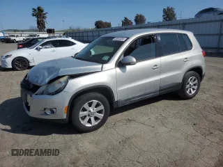 2010 Volkswagen Tiguan S with VIN WVGAV7AX9AW519312, listed as a Copart auction lot 48633055 with 94,740 mi miles and Salvage title. Bid and sale history available at DreamBid. Image 1.