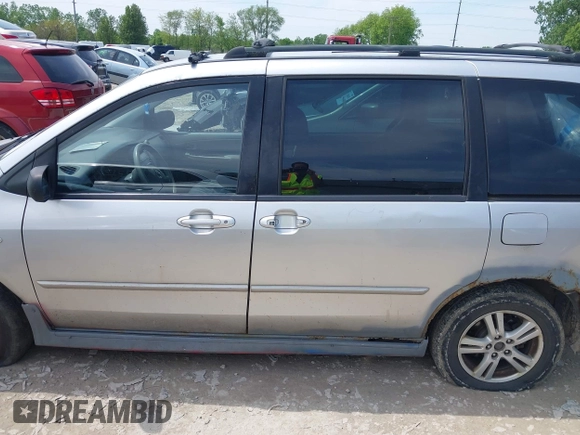 2004 Mazda MPV ES z VIN JM3LW28J740506782, wystawiony jako IAAI lot #42223428 z przebiegiem 202 865 mil mil oraz . Historia ofert i sprzedaży dostępna na DreamBid. Obrazek 14.