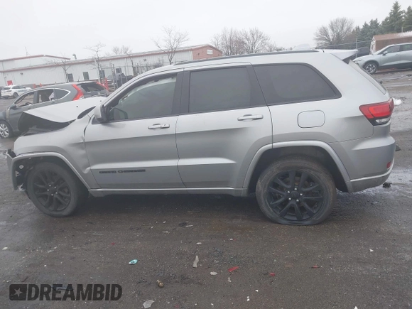 2017 Jeep Grand Cherokee Laredo with VIN 1C4RJFAG2HC927028, listed as a IAAI auction lot 41998255 with 109,569 mi miles and . Bid and sale history available at DreamBid. Image 14.